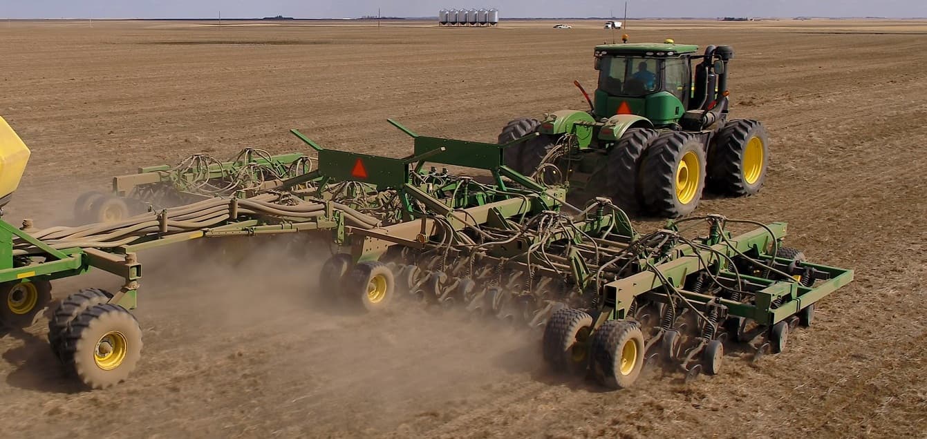 Seeding drill working a prairie field